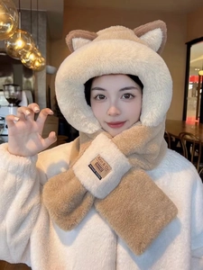 Detail of plush hooded scarf with bear ears in cream and tan faux fur material