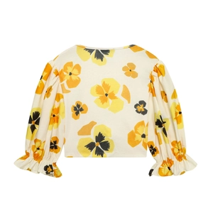 Floral print long sleeve top with puff sleeves and ribbed texture in cream white