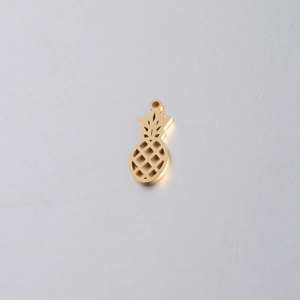 Polished golden stainless steel hollow pineapple pendant with a shiny mirror finish