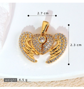 Detailed view of heart wing pendant showing dimensions 2.7cm by 2.3cm and 4.5g weight