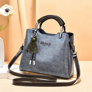 Blue-grey wax leather tote bag with PU texture, green charm and detachable strap
