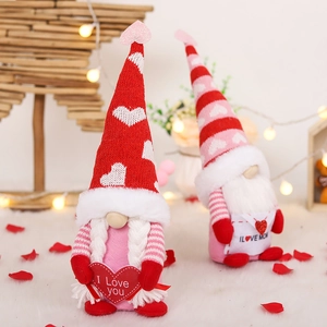 Handmade Valentine's Day faceless gnomes with heart patterns and I Love You text