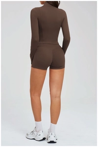 Rear view of deep brown high-stretch fitness set with slim-fit top and lifting shorts