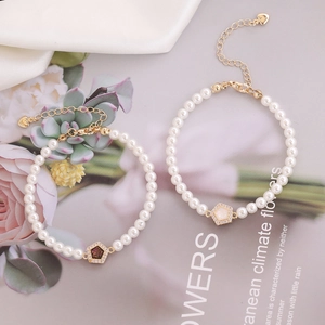 Luxury 18K gold plated bracelet featuring pearls and geometric zircon pendants
