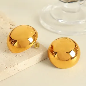 Polished gold spherical titanium steel stud earrings with premium mirror finish metal