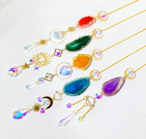 Set of five hanging crystal suncatchers with natural agate slices and moon sun charms