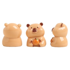 Three-piece set of cute brown resin capybara figurines in front, back and side view