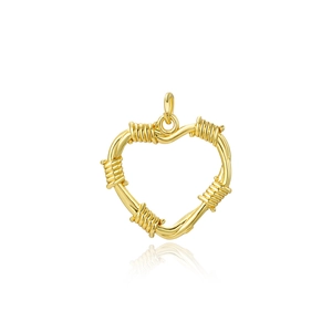 Macro detail of a gold plated heart pendant featuring a hollow thorn wire design