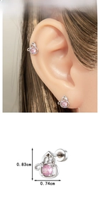 Detail view of gourd-shaped steel stud earring with pink zircon and screw back