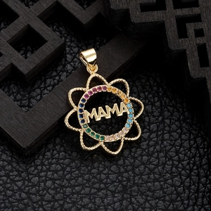 Gold-plated MAMA pendant necklace with colorful zircon gemstones on a black background