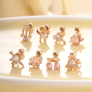 Set di orecchini in oro rosa con motivi angelo, ciliegia, fiocco e zirconi rosa