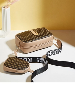 Detail of crossbody camera bag with geometric pattern, coin purse and woven strap