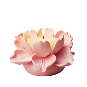Pink lotus flower candle holder with multi-layered petals and burning white tea light