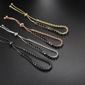 Adjustable tennis bracelet with black cubic zirconia in gold, silver, and rose gold plating