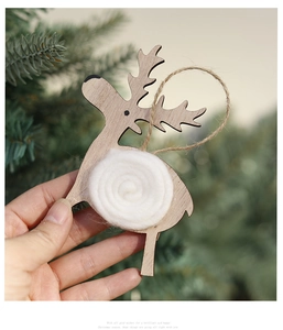 Christmas reindeer wooden pendant with white wool ball detail and rustic twine hanger