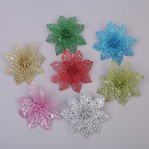 Close-up of glittered hollow poinsettia flowers in seven colors for Christmas decoration