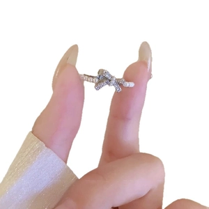 Elegant zircon bow pearl open ring with silver finish and sparkling stones for women