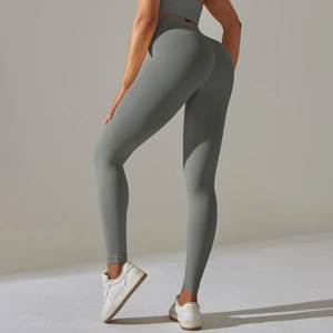 Detailed back view of dark grey seamless yoga pants with high waist and push up lift effect