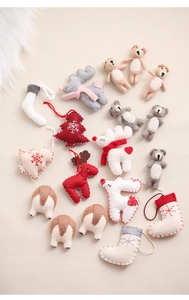 Handmade wool felt Christmas ornaments including reindeer, tree and corgi butt shapes