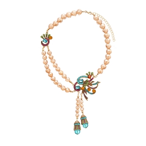Ethnic peacock pendant necklace with champagne beads and colorful crystal rhinestones