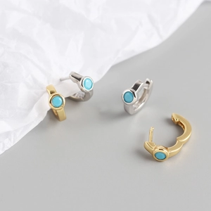 Elegant gold and silver S925 huggie earrings with turquoise blue cubic zirconia stones