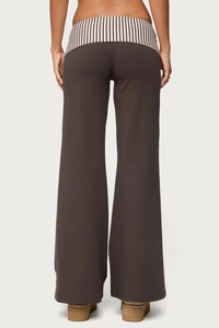 Back view of brown wide-leg trousers with striped waist contrast and relaxed fit