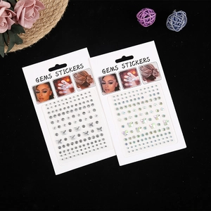 Self-adhesive glitter facial gems stickers for makeup and hair styling on black background