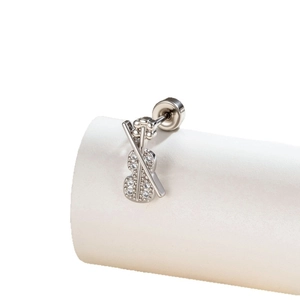 Exquisite silver violin and bow stud earring with sparkling zircon inlays on a white stand