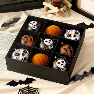 9-piece Halloween skull and pumpkin decorative balls set in a black display box
