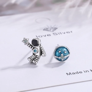 Cute astronaut and blue planet asymmetric stud earrings with silver metal and zircons