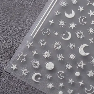 3D relief nail art stickers with white star and moon patterns on matte base sheet