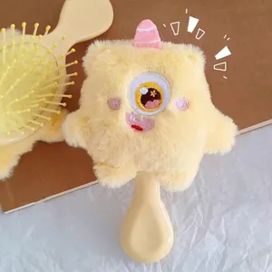 Cute yellow plush monster hairbrush with soft cushion massage bristles and 3D eye detail