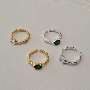 French vintage irregular gold and silver rings set with emerald and white zircons