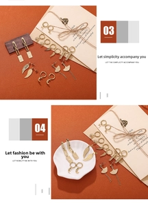 Detailed set of 18K gold plated titanium steel earrings with star and moon charms