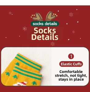 Dettaglio del polsino elastico e del ricamo di Babbo Natale sulle calze di cotone gialle