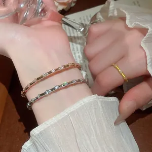 Elegant bamboo design open bangle and ring set with zircons in gold and silver finish