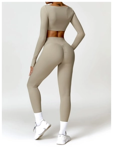 Detail view of high waist yoga leggings with scrunch butt lifting effect in khaki