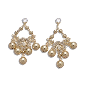 Elegant gold earrings with flower zircon studs and polished metallic bead tassels on white background