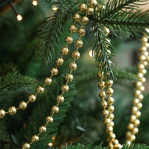 Golden plastic beaded garland wrap for Christmas tree decoration with metallic finish
