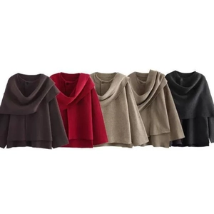 Women's asymmetrical knitted poncho wraps available in five solid autumn colors