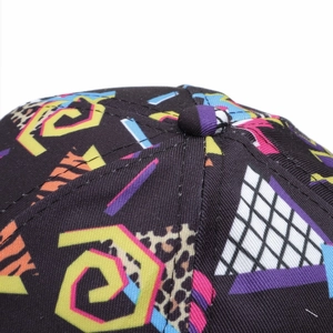 Macro view of retro 90s print baseball cap crown showing texture and precision stitching