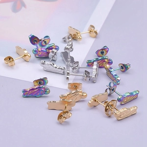 Detailed view of colorful 304 stainless steel stud earrings in abstract human shapes