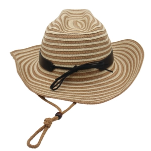 Detail of striped straw sun hat featuring brown leather strap and adjustable chin cord