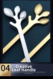 Close-up of creative gold and silver stainless steel branch handles with leaf details