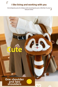 Detail of red panda plush bag showing dual-use straps for shoulder or backpack wear