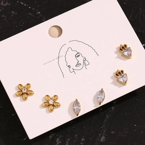 Set of 3 pairs of 18K gold plated flower and heart zircon stud earrings on display card