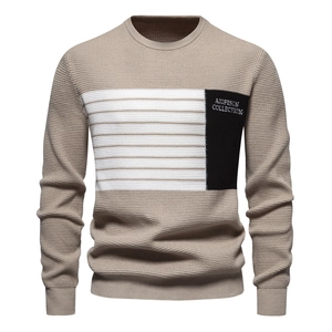 Men's khaki waffle knit sweater with black and white color block stitching and crew neck