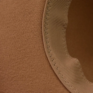Detail of wool fedora interior showing ribbed sweatband and precision reinforced stitching