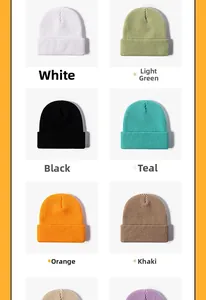 Flat lay of knit beanies in six colors showing thick ribbed texture for winter warmth