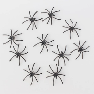 Set of 10 realistic black plastic spiders for Halloween decor and spooky party accessories